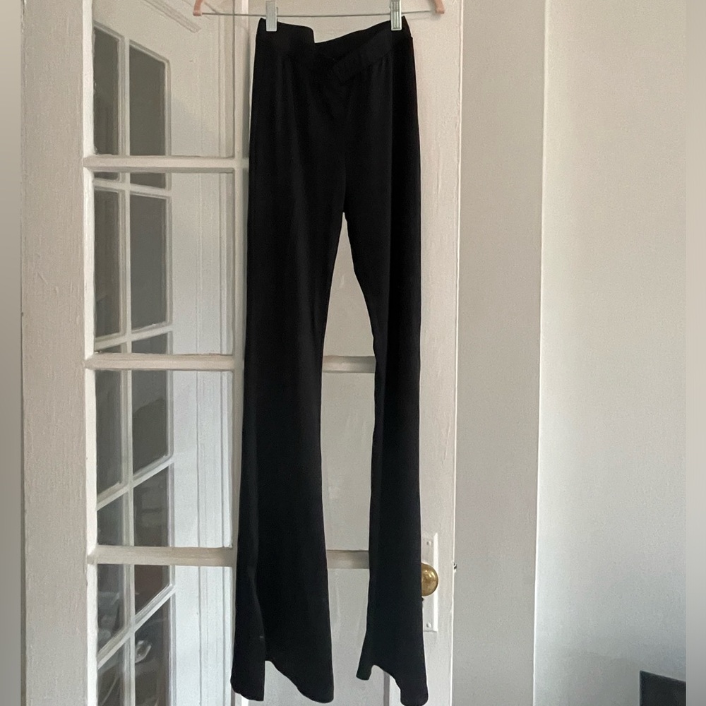 Stretchy flare black pants from Princess Polly.